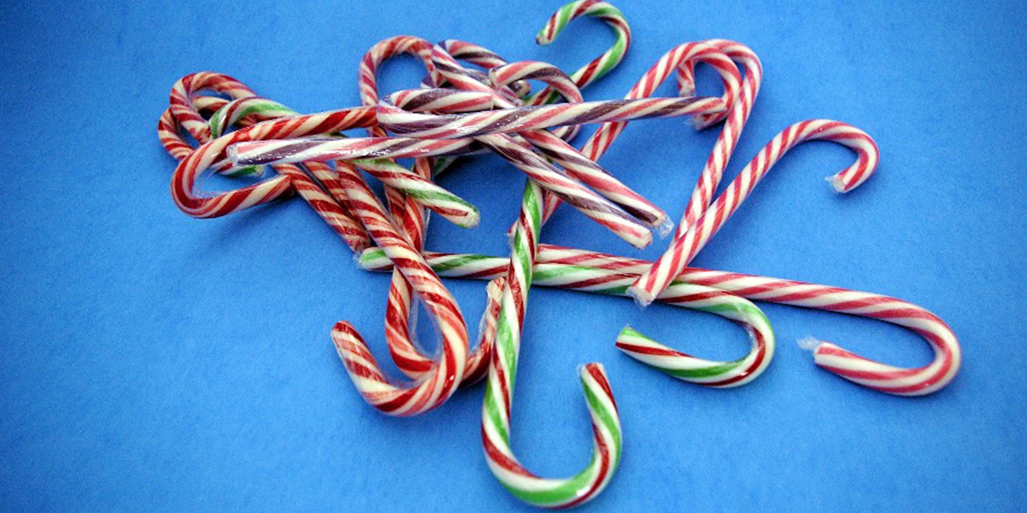 Candy Canes on Blue Background